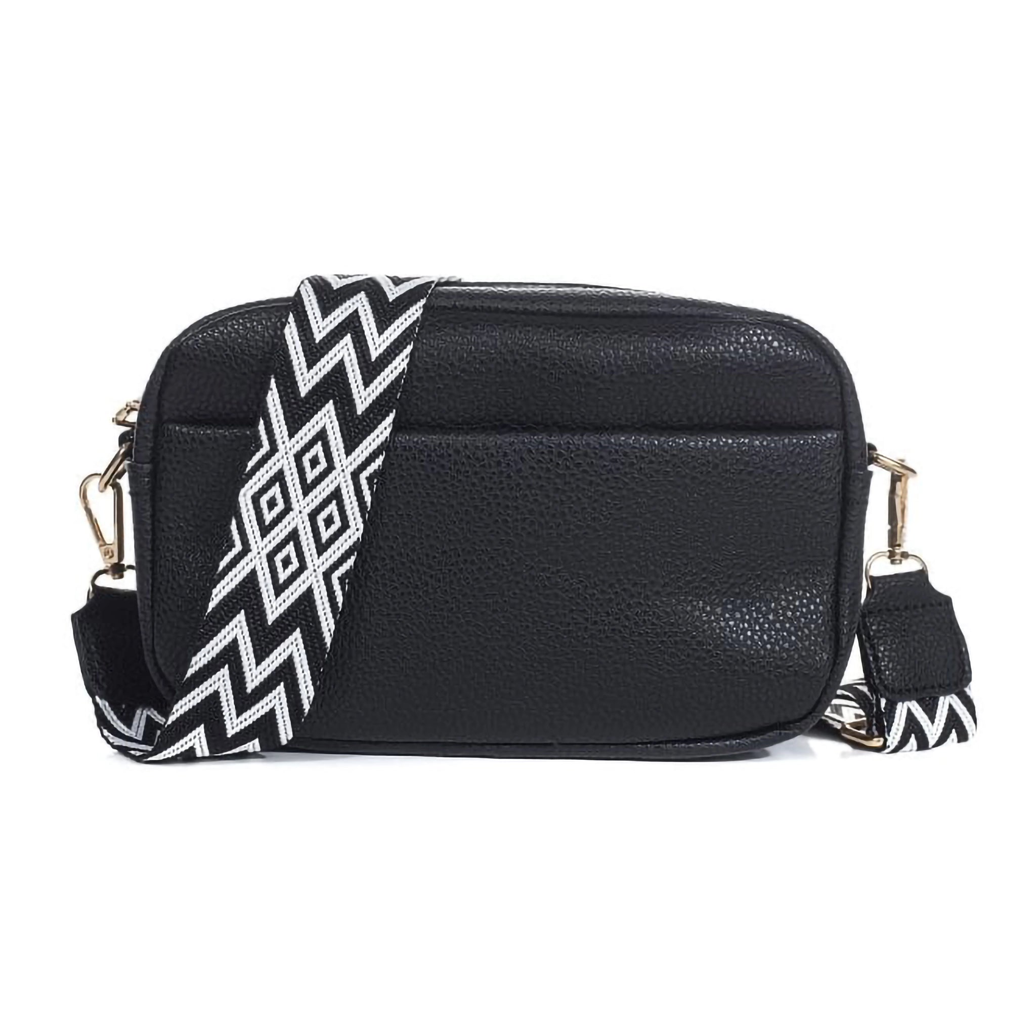 A black leather look camera bag with a western look black and white strap