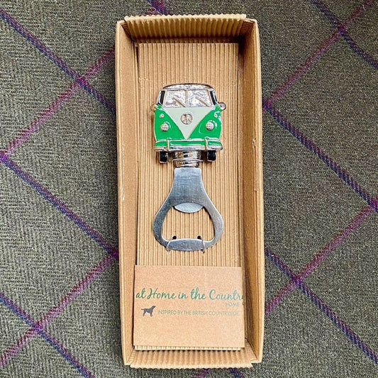 An enamelled campervan bottle opener in green and white in box