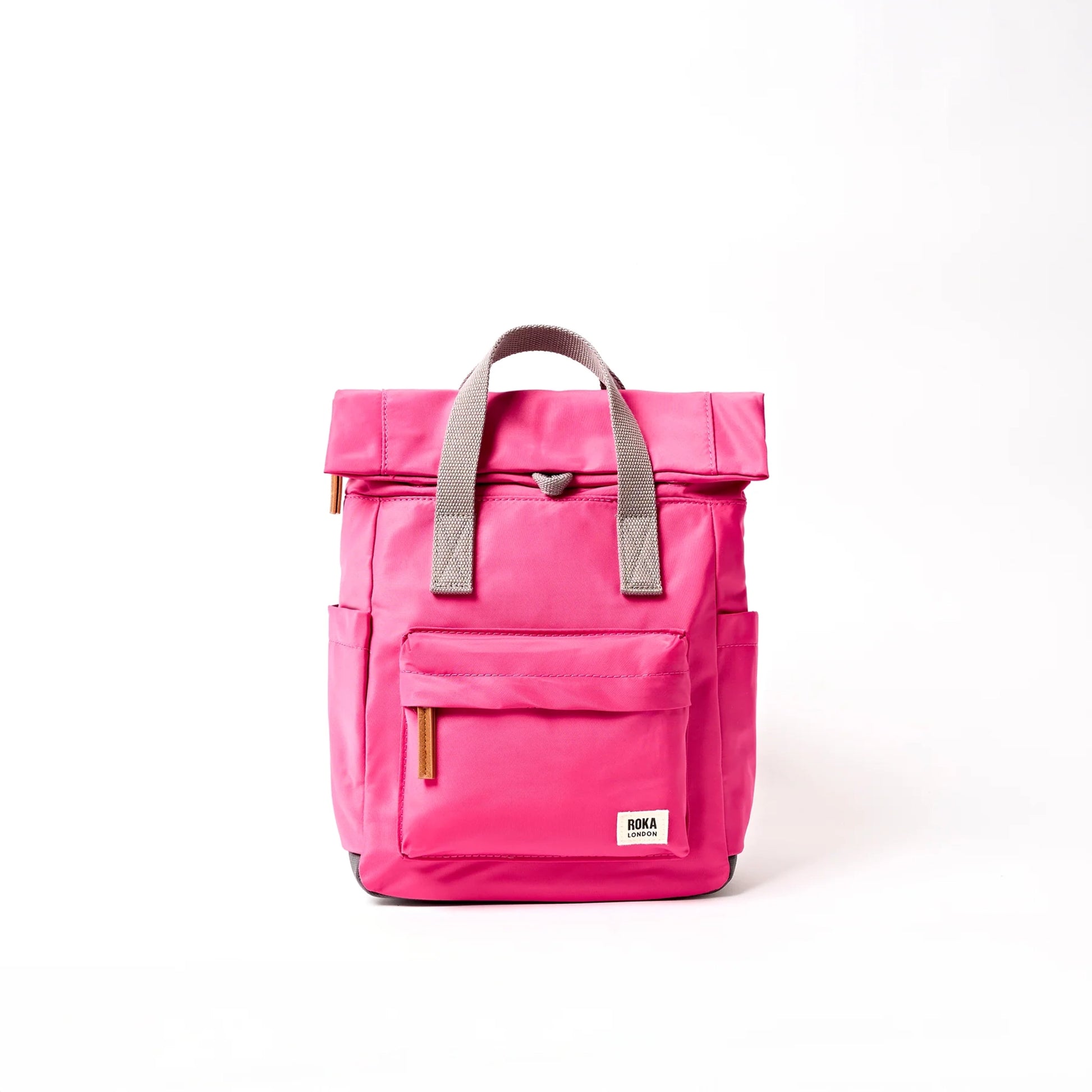 Bright pink hiking roll top backpack with grey handle