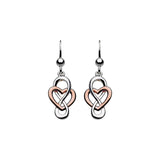 A pair of silver drop earrings with a rose gold heart shape 