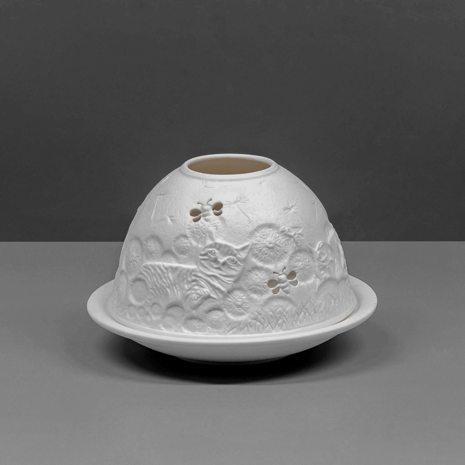 White porcelain tall dome candle holder with engraved cat and bees design