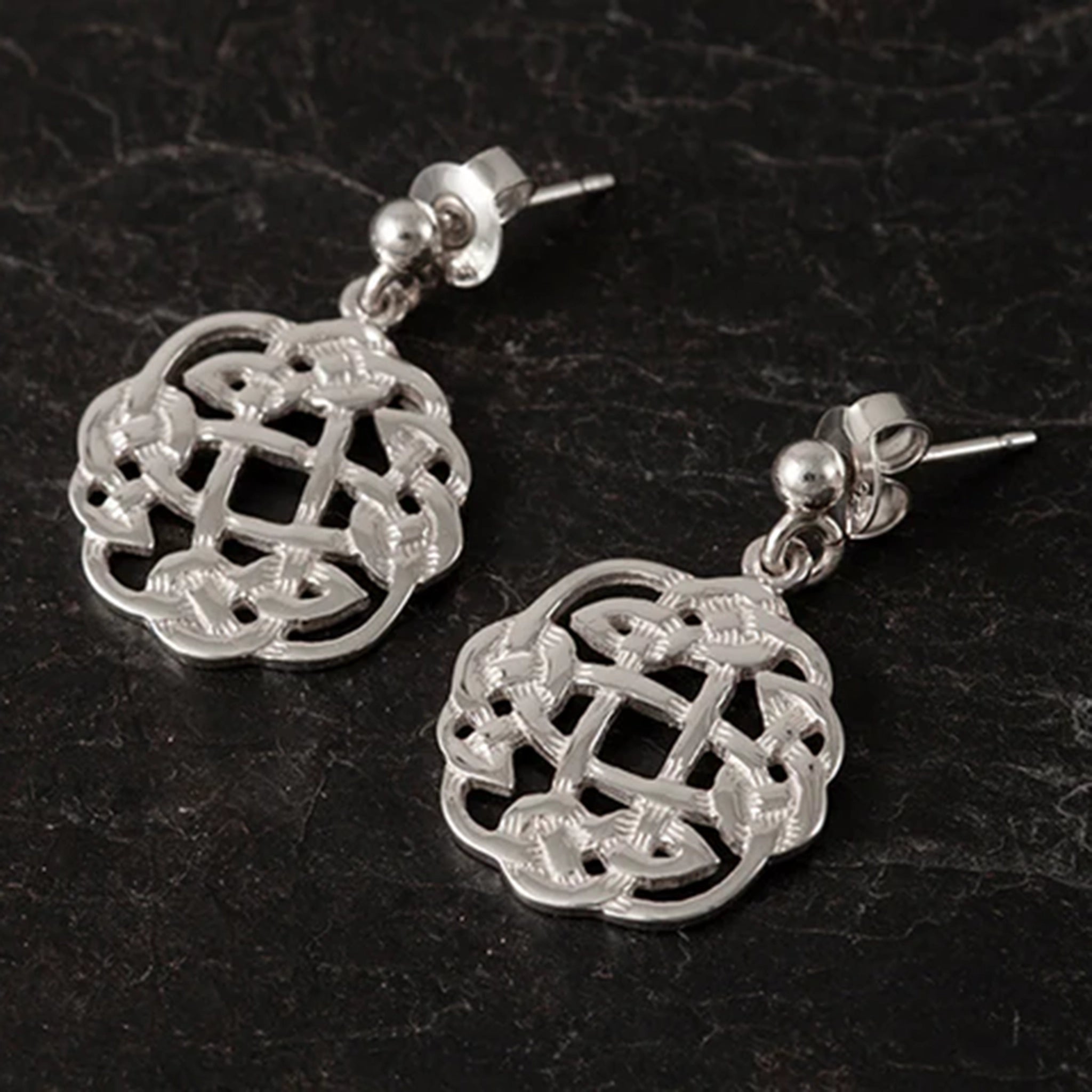 A pair of silver weave Celtic knot drop earrings on stud backings