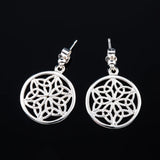 A pair of silver multi trinity knot round drop earrings on stud fittings