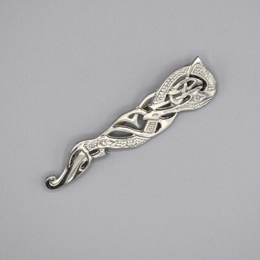 Kilt pin with abstract Celtic design with a twisting dragon-like shape