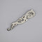 Kilt pin with abstract Celtic design with a twisting dragon-like shape