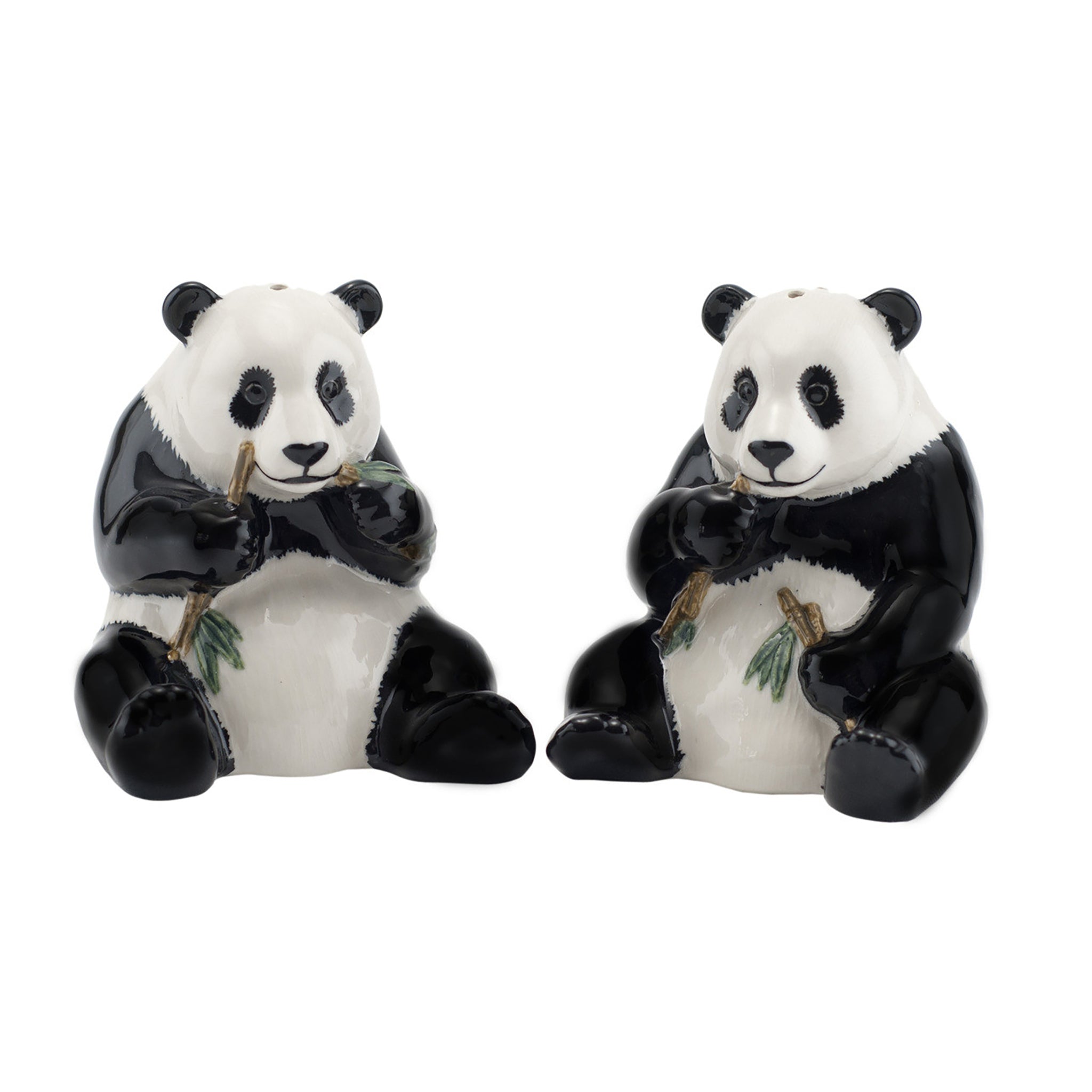 Pair of glazed salt and pepper shakers shaped like panda bears eating bamboo