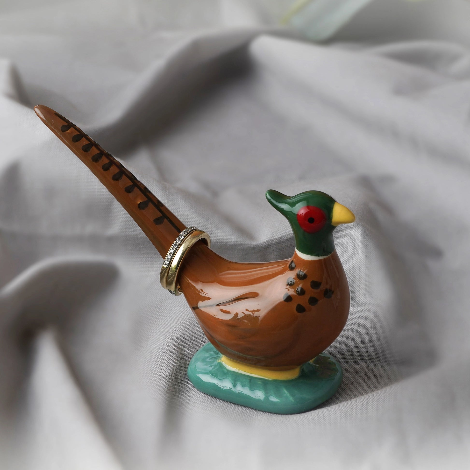 A ceramic pheasant ring holder lifestyle