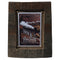 A frame made with whisky barrel wood and Harris Tweed