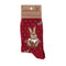 A folded pair of Christmas socks in red with a rabbit in a Christmas pudding 