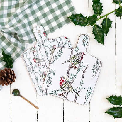 A double sided melamine chop board with a Christmas robin design
