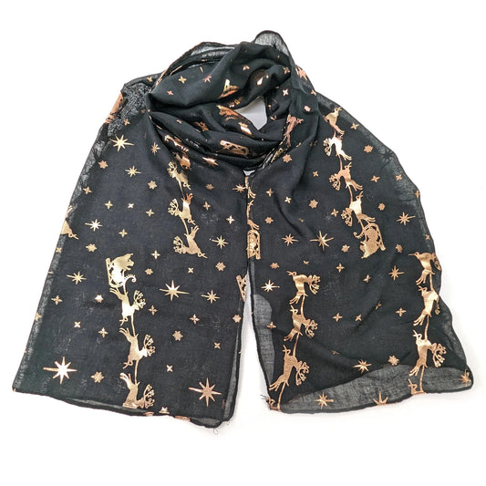 A black scarf with rose gold foil Santa sleigh and reindeer repeating pattern