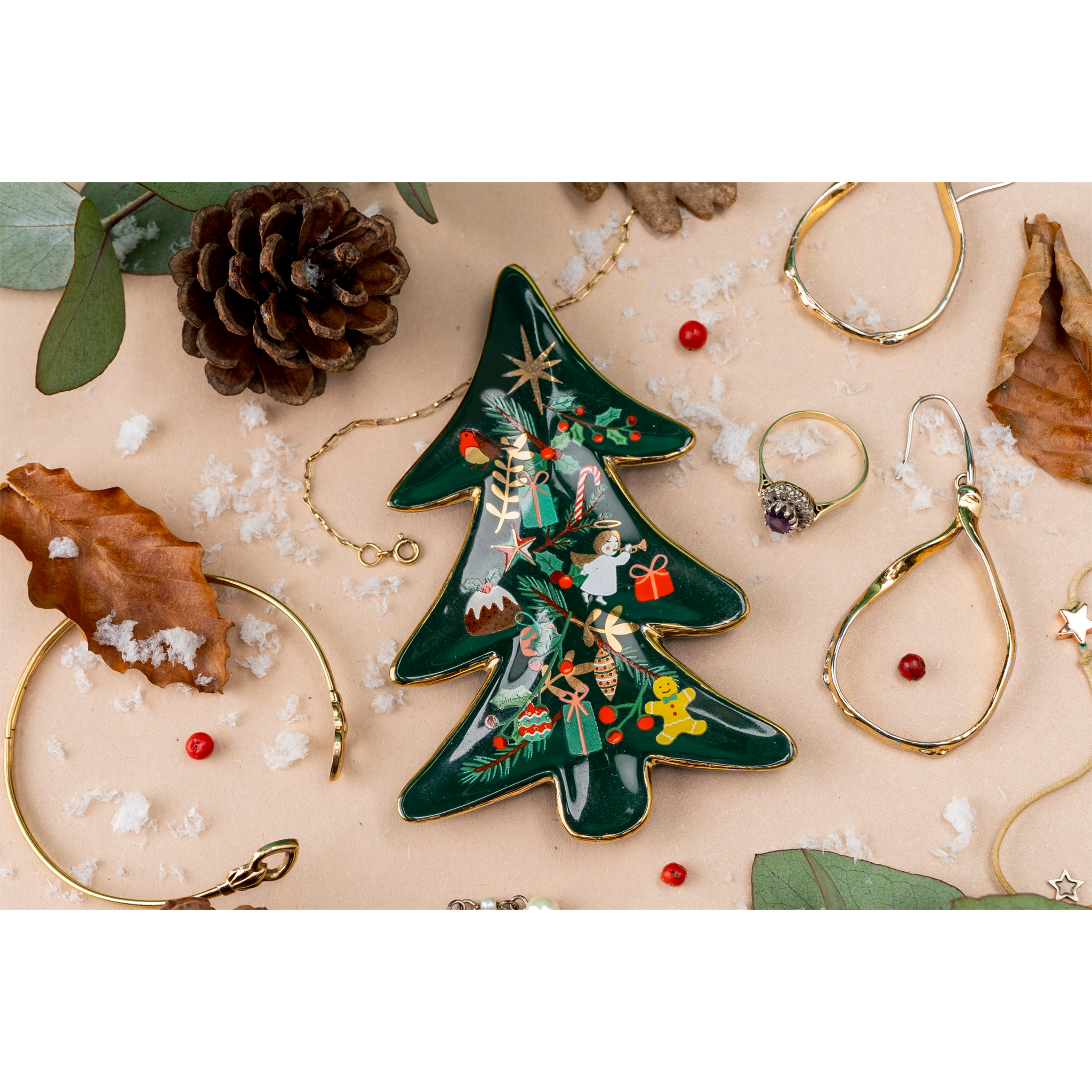 Christmas tree shaped trinket dish with painted decorations and gold leaf lifestyle