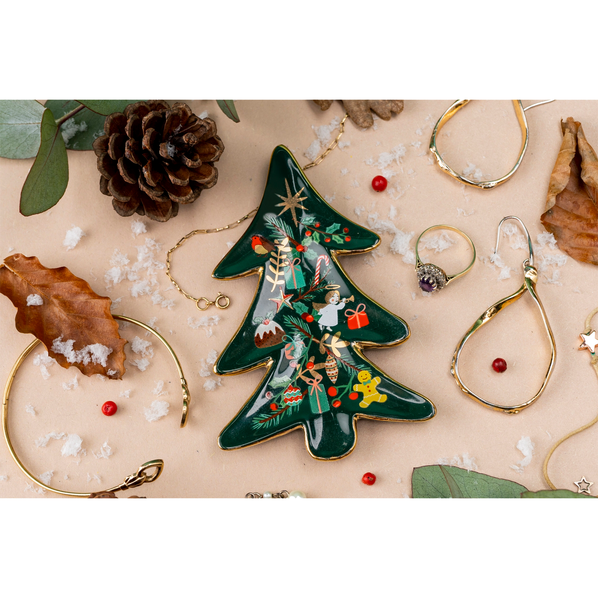 Christmas tree shaped trinket dish with painted decorations and gold leaf lifestyle