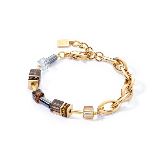 A bracelet with brown cube shaped stones and chunky gold chain details