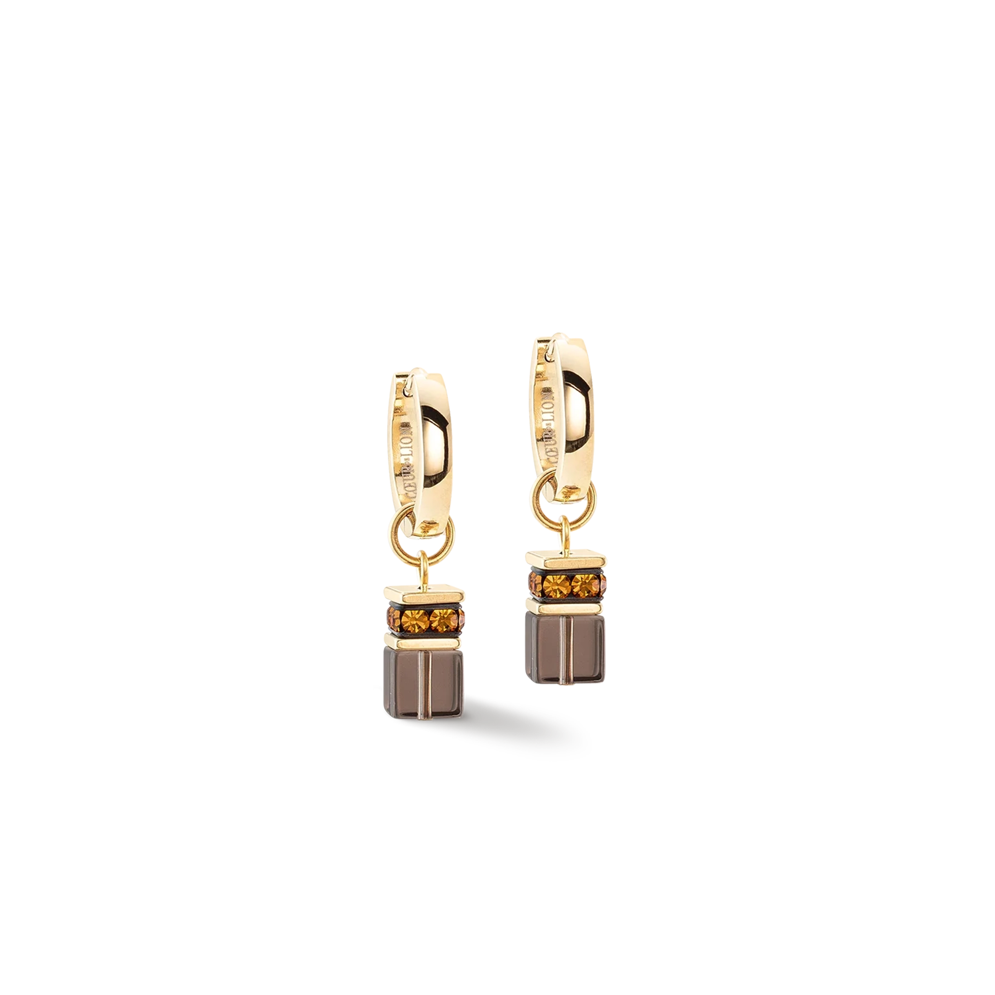 A pair of earrings with brown cube shaped stones and chunky gold chain details