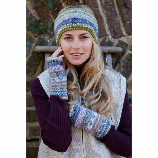 Model wearing an olive, blue and purple fairisle patterned knitted headband