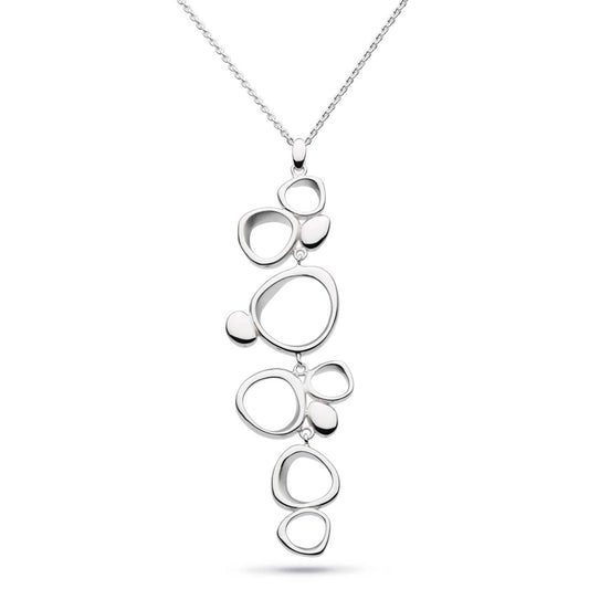 A silver pendant featuring a long cascade of pebble shapes in irregular sizes