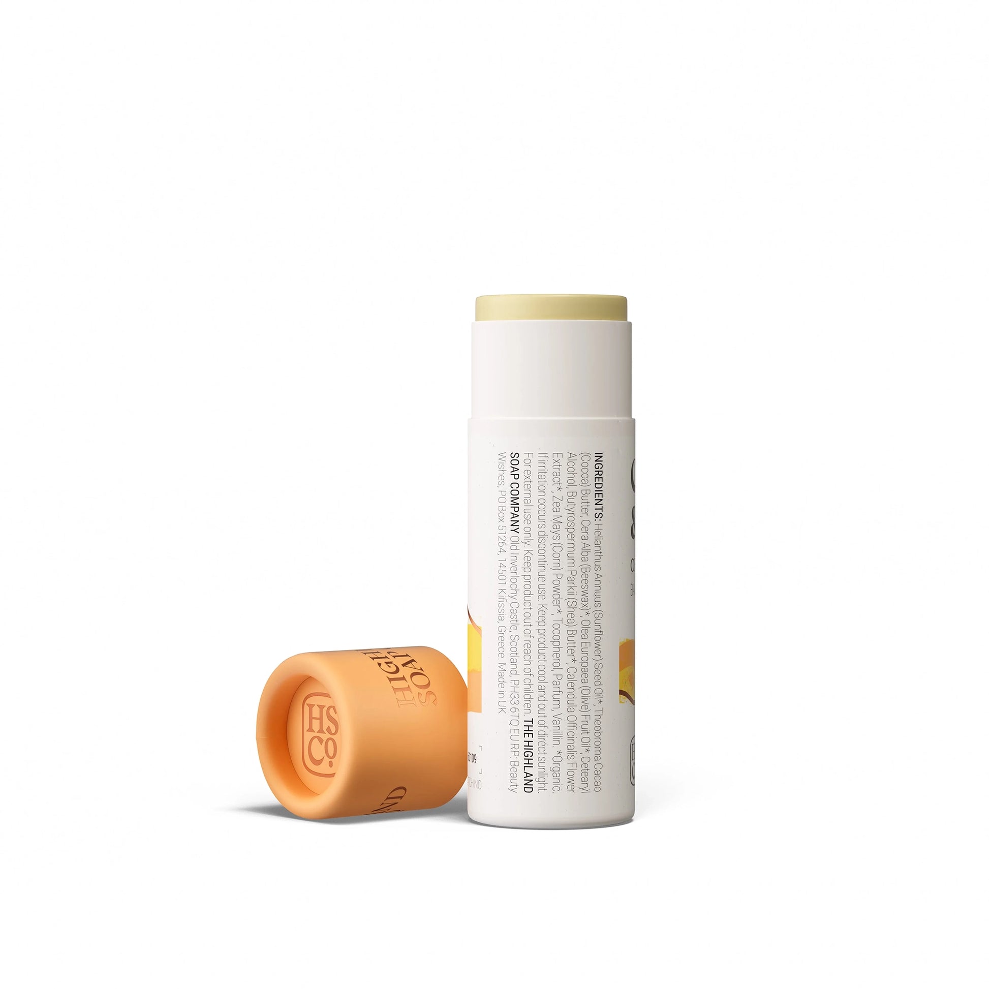 Highland Soap Co. coconut and vanilla flavour organic lip balm in compostable tube packaging with ingredient list
