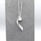 Pendant featuring a simple silver loose coil twist design