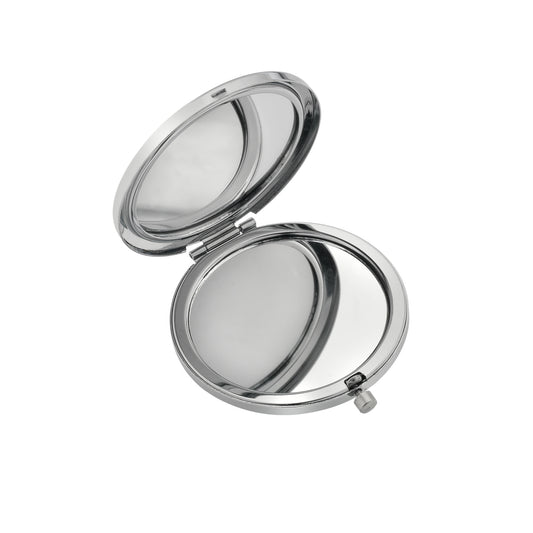 An open round compact mirror