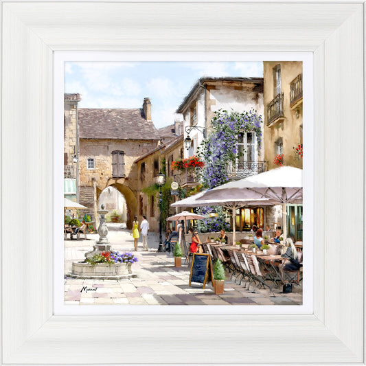A square framed print featuring a French cafe scene