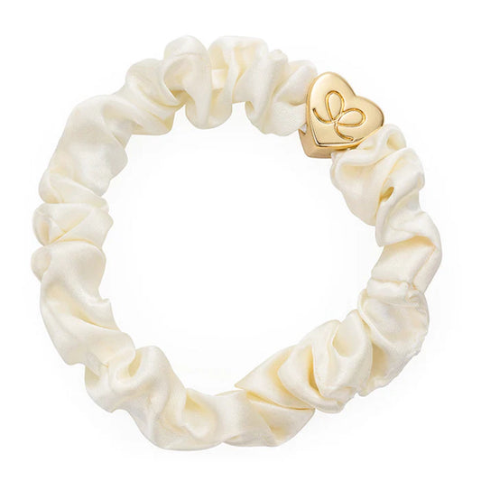 Cream hair scrunchie with gold heart charm
