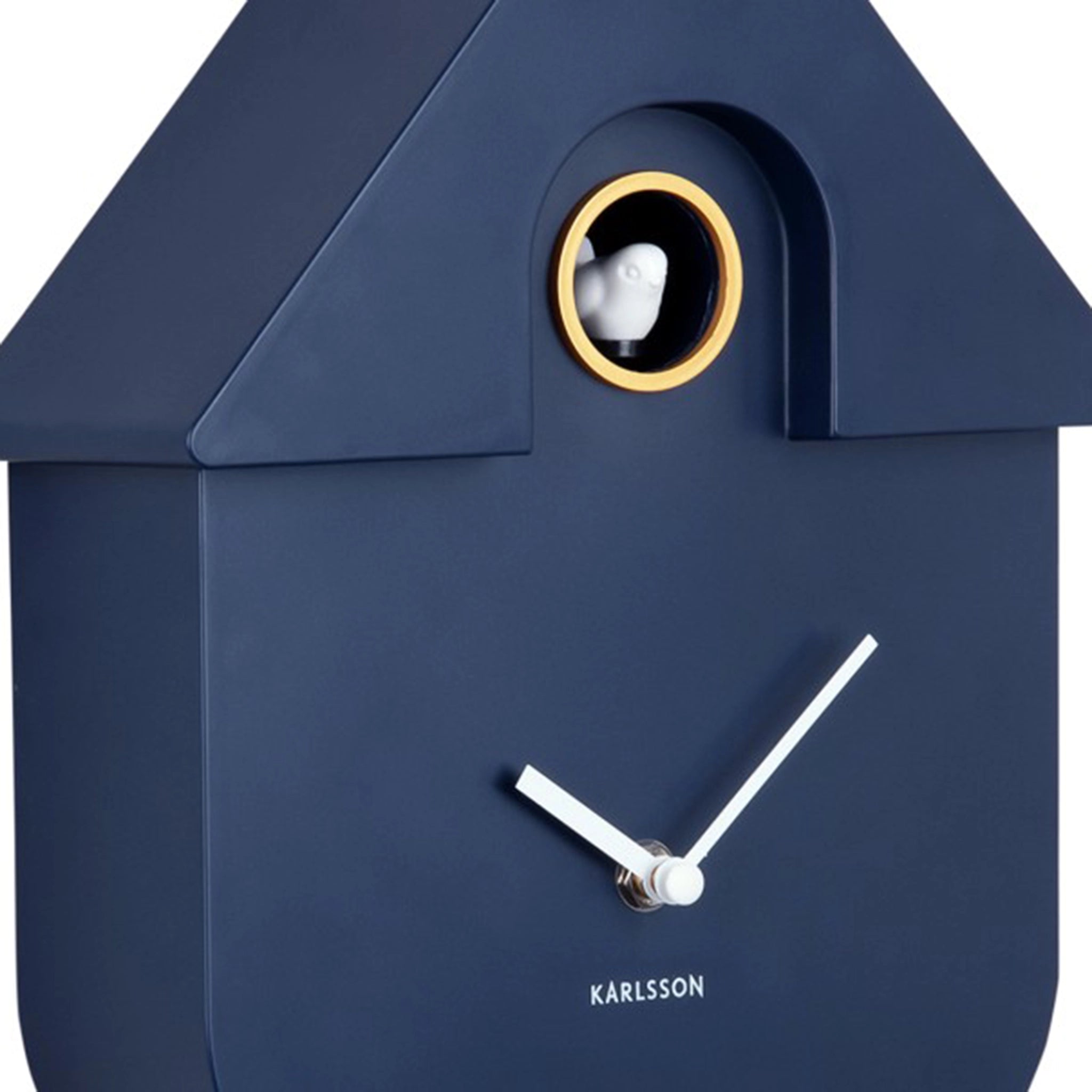 Detail of a modern dark blue coloured cuckoo clock 