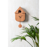 A dark wood finish modern cuckoo wall clock lifestyle