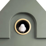 Detail of a modern natural green coloured cuckoo clock