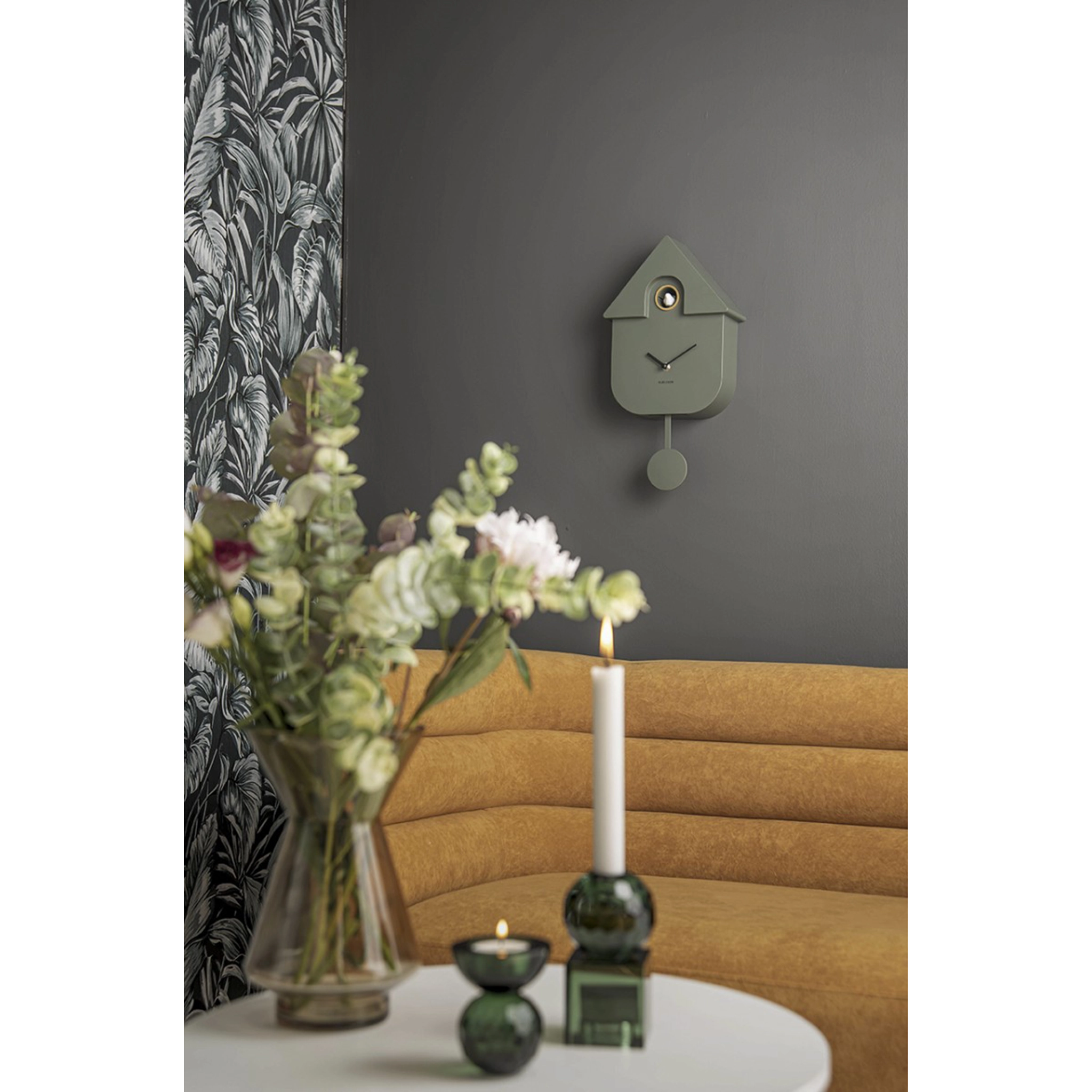 A modern natural green coloured cuckoo clock lifestyle