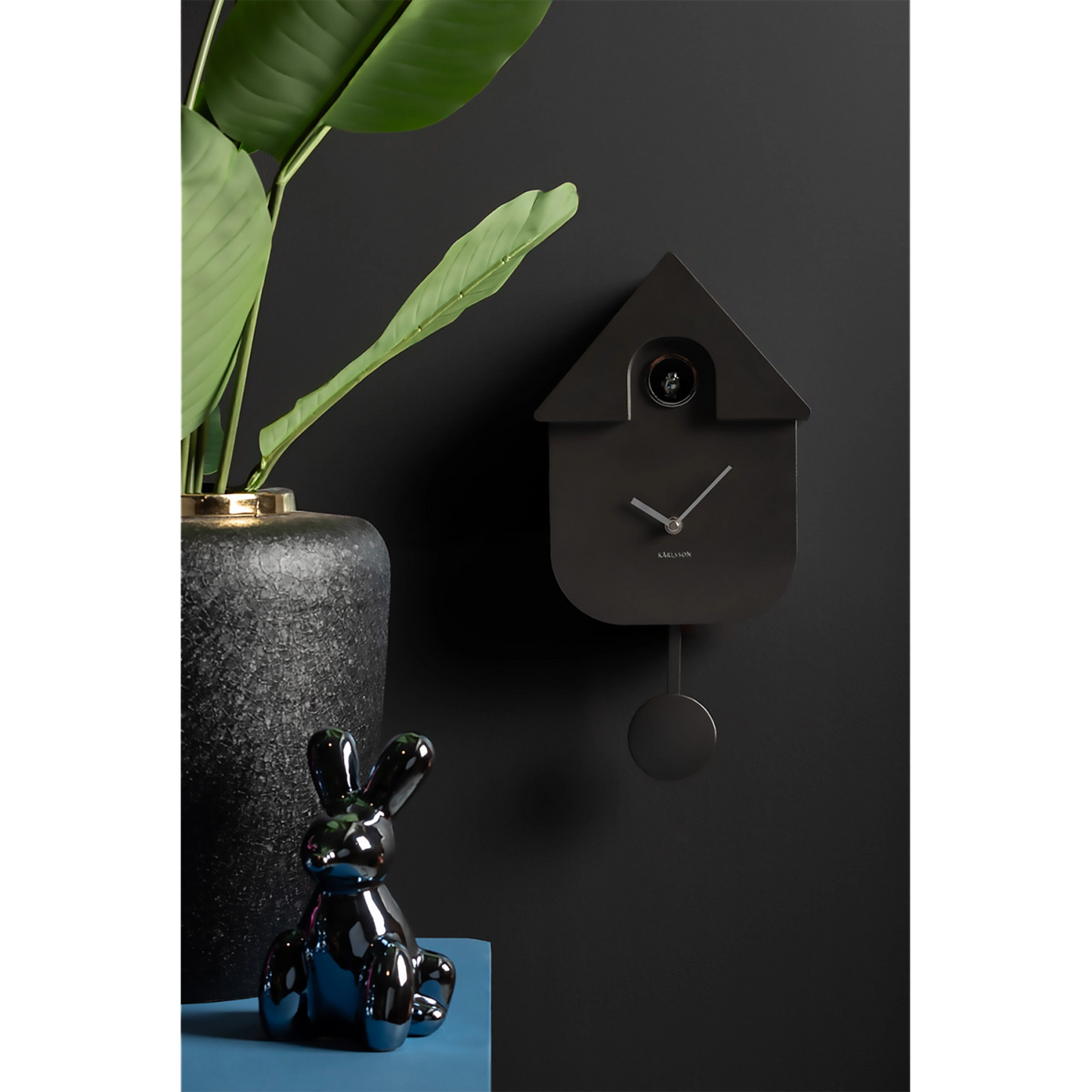 A dark metallic grey modern cuckoo clock lifestyle