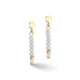 A gold pair of earrings with cut ice blue glass beads