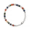 A bracelet beaded with natural stones and stainless steel, finished with an adjustable lobster clasp