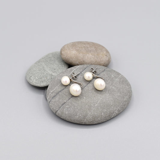 Stud earrings with round white pearls and detachable larger pearls