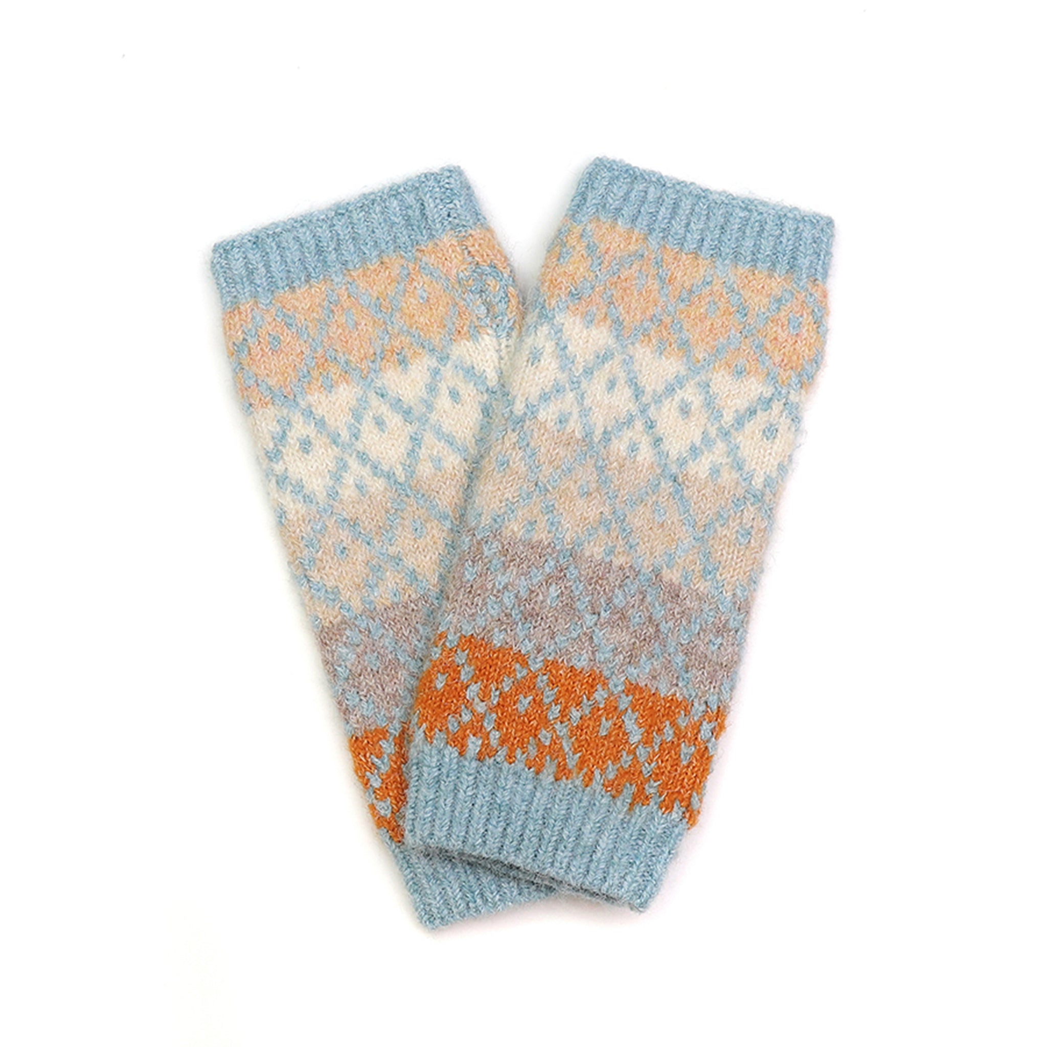 A pair of wrist warmers with blue, orange and natural toned stipes overlayed with a diamond pattern