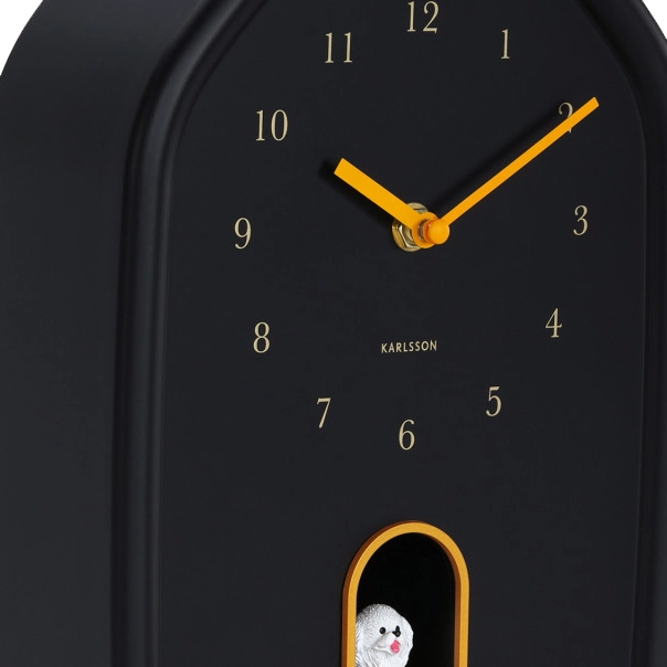 Black wall clock with yellow gold details, Arabic numerals  and white dog cuckoo 