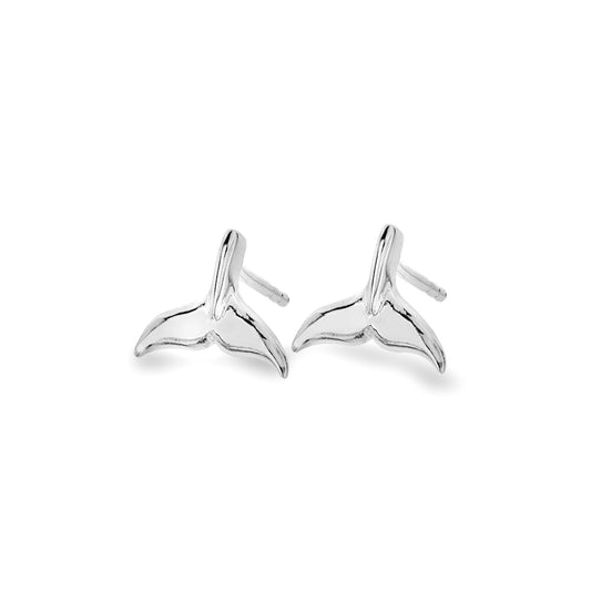 A pair of silver stud earrings shaped like dolphin tails
