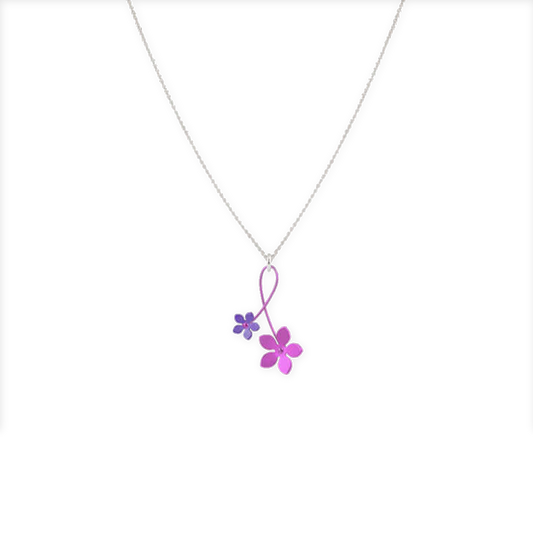 A pendant with two pink crossed over 5 petal flowers 