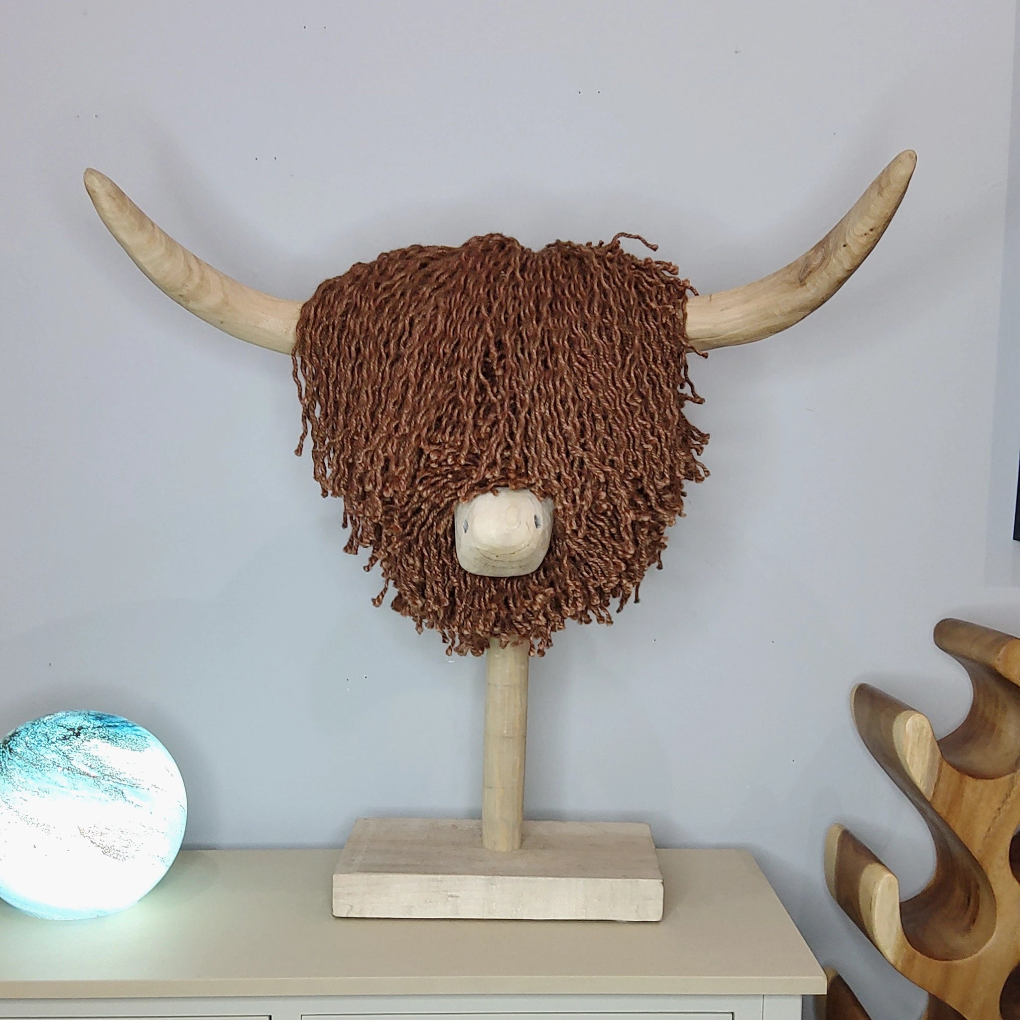 Natural jute brown fiber Highland cow sculpture on a stick stand