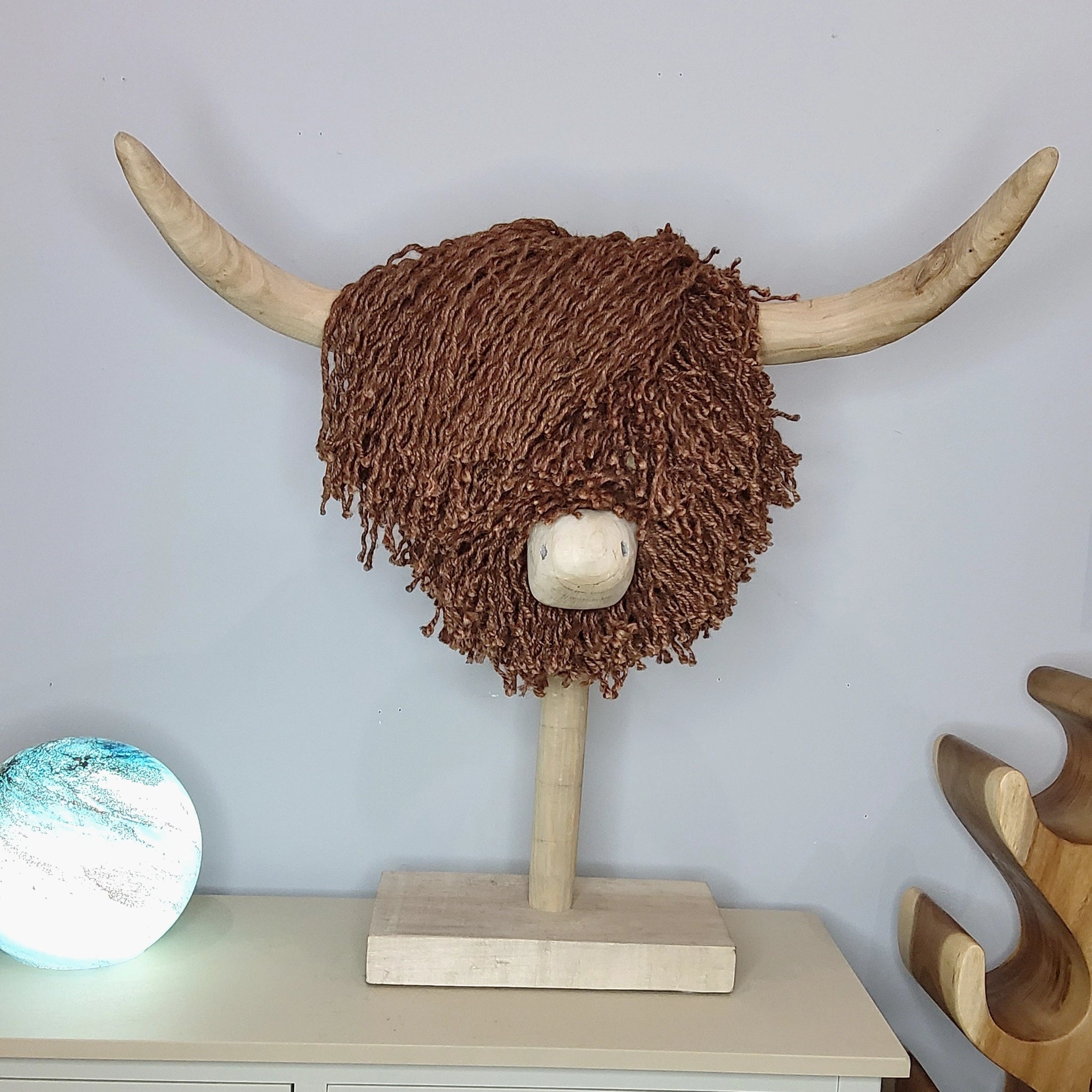 Natural jute brown fiber Highland cow sculpture on a stick stand styled