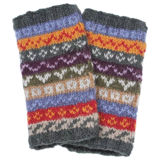 A pair of knitted handwarmers with a Fair Isle pattern in neutral tones