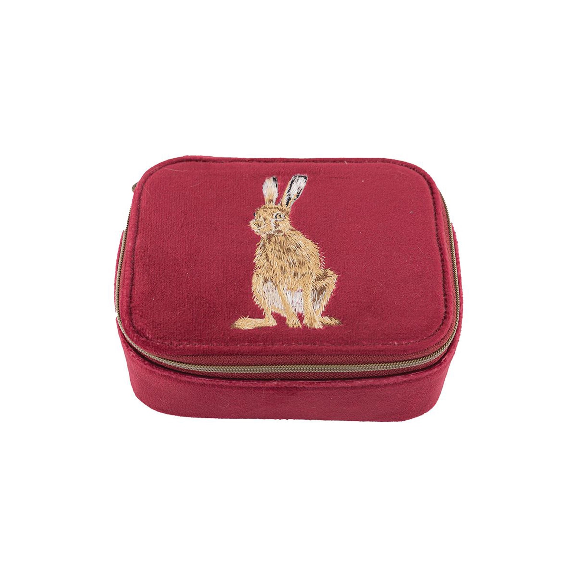 Red faux suede zip accessory case with embroidered Hare design