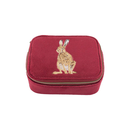 Red faux suede zip accessory case with embroidered Hare design