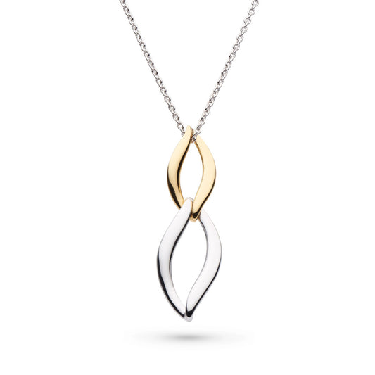 A pendant featuring linked marquis twists in silver and gold