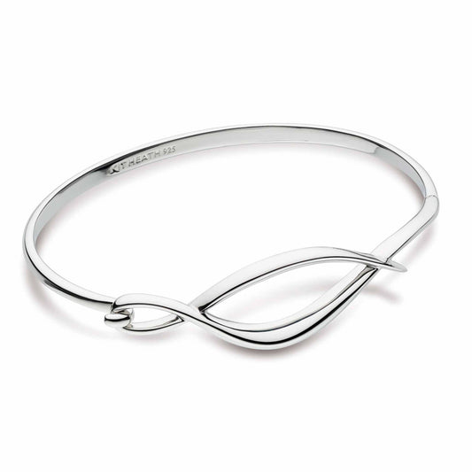 A bangle with a silver twist marquise shaped hinged clasp
