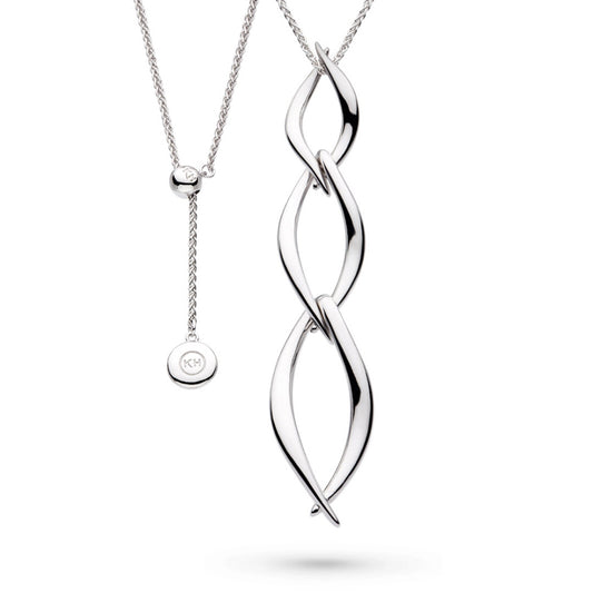 A pendant featuring three linked marquis twists in silver