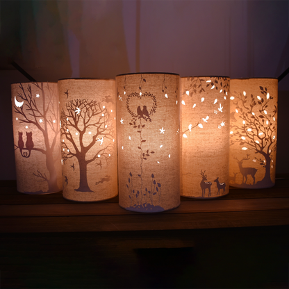 Row of linen look glow fabric table lamps