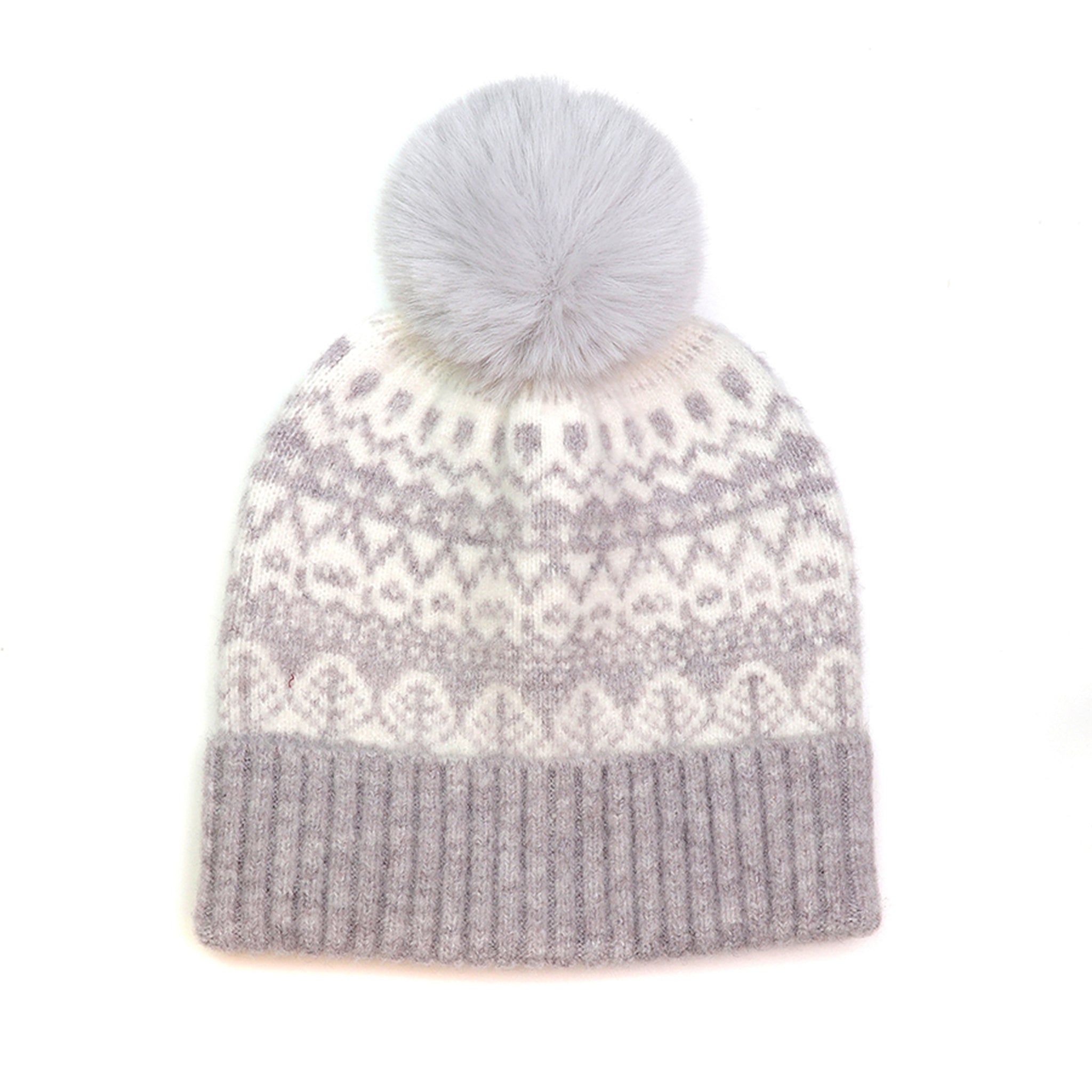 A pale grey and white fair isle patterned hat with grey fluffy pompom