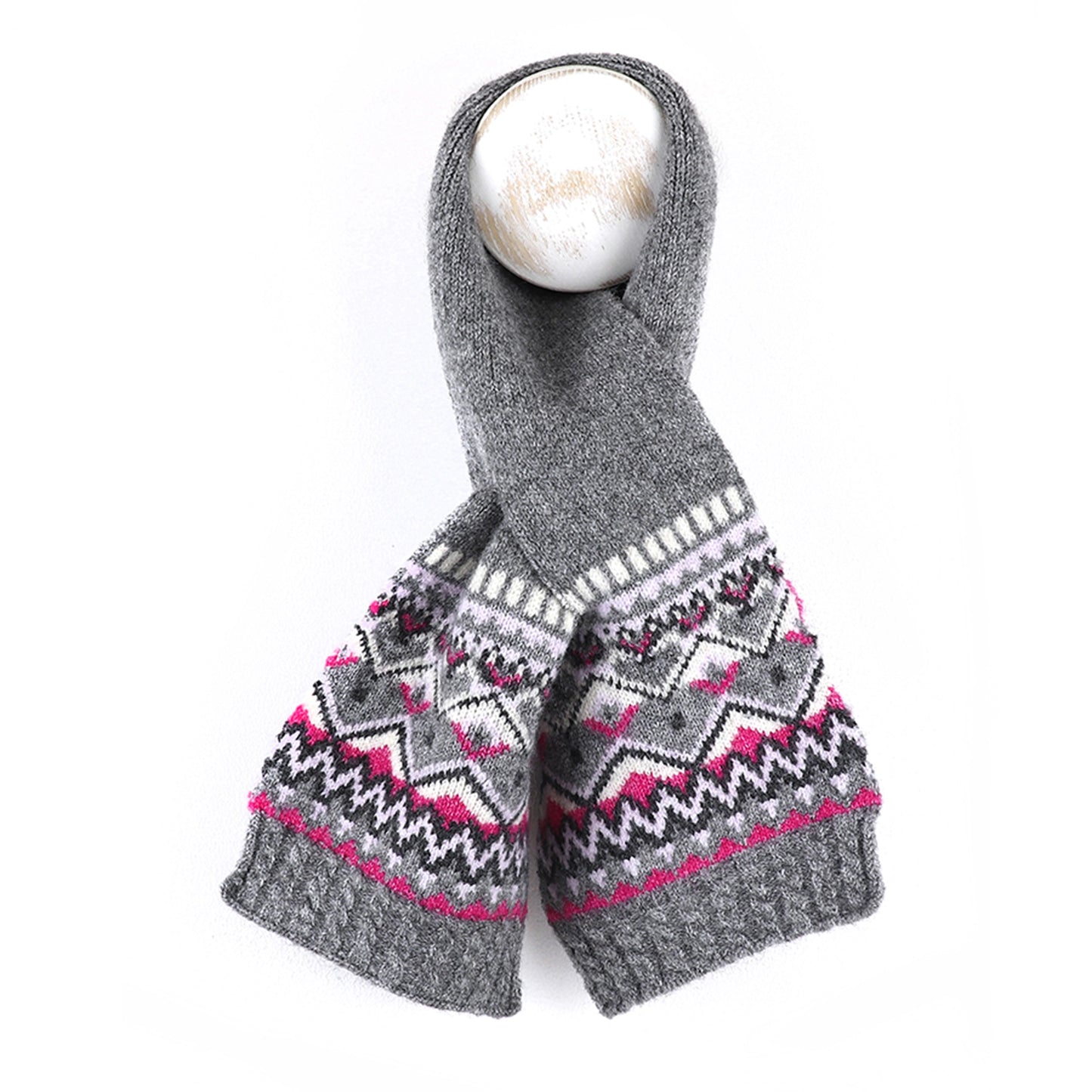 A knitted grey pull through scarf with pink fair isle pattern