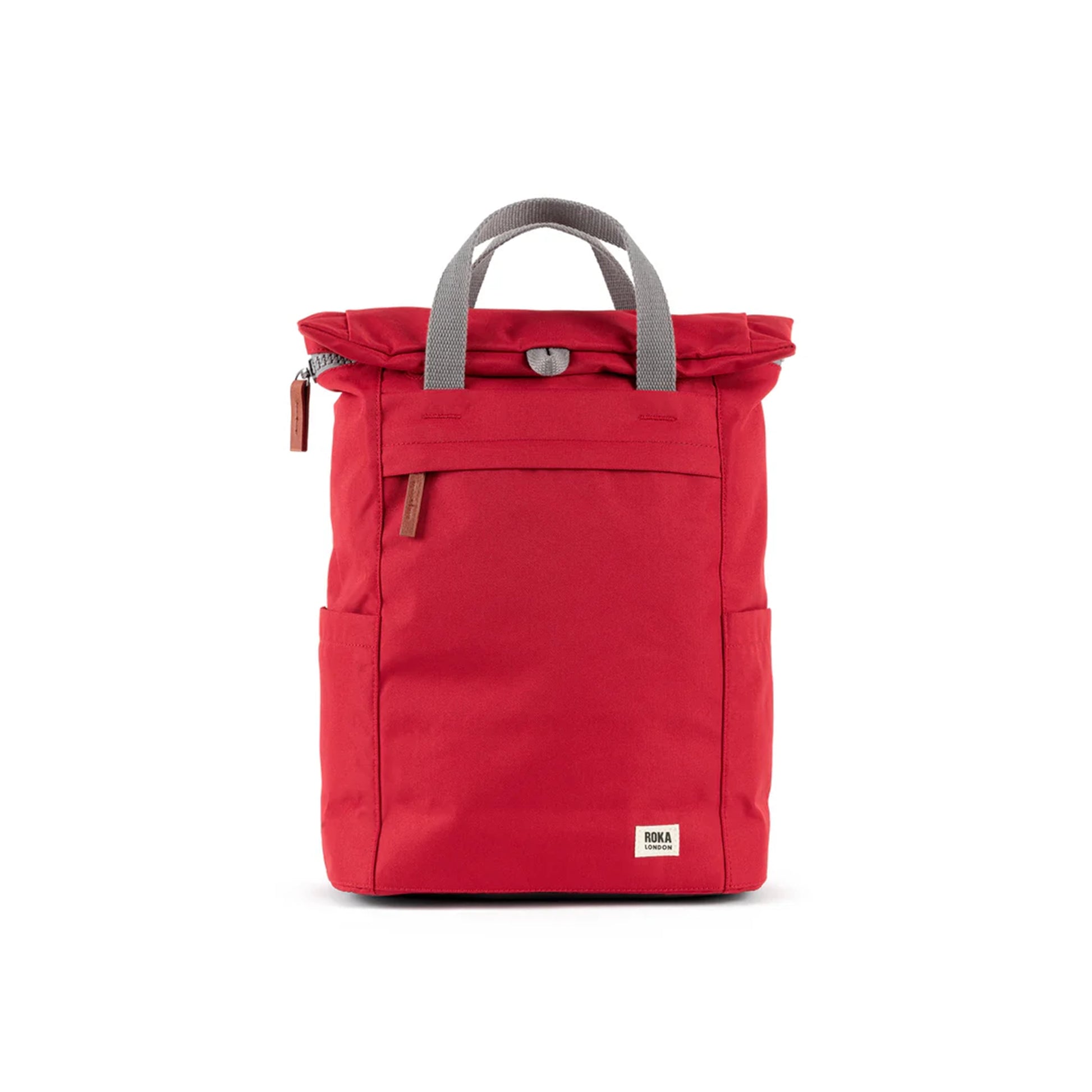 Red rolltop backpack with grey grab handles